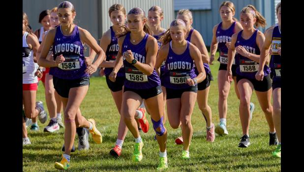 Augusta runners break out at the start of the girls' race at the Augusta Invitational.Photo by James Truog