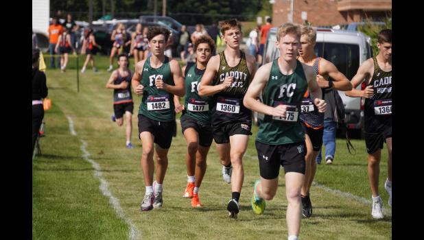 Group of Fall Creek boys runners in the Knutdson Invitational. Photo by Dave Strasburg