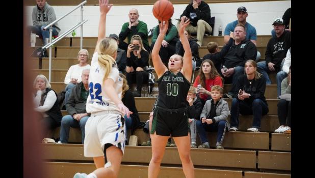 Fall Creek's Kennedy Tumm takes a jump shot against Mondovi during a recent game. Photo by Dave Strasburg