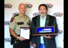 Gregg Moyer, Safety Director California Overland, Ltd. (right) is pictured with Captain Jon Olson, Commander of the Commercial Division of the Minnesota State Patrol.