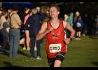 Wabasha-Kellogg senior Griffin Riesgraf runs to second place in the Jodi Rahman Invitational cross country meet on Oct. 13 in Plainview. He finished the 5,000-meter course in 15:47.7, about 14 seconds behind individual champion Ryan Littlefield of Winona Cotter/Hope Lutheran.   Photos by Richard Johnson