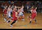 Grabbing a rebound, Gilmanton junior Hailey Bork dribbled up the court.