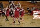 E-S senior Anna Schoen looked to make a move around Gilmanton’s Morgan Fillmore. Schoen scored six points for the Lady Cards, who had eight players contribute on the offensive end.