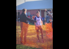 Augusta cross country runner Beth Boone cross the finish line at the Dairyland Conference Meet