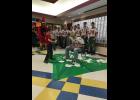 Strum Primary students were rewarded for meeting reading goals with the opportunity to “pie” E-S football players.