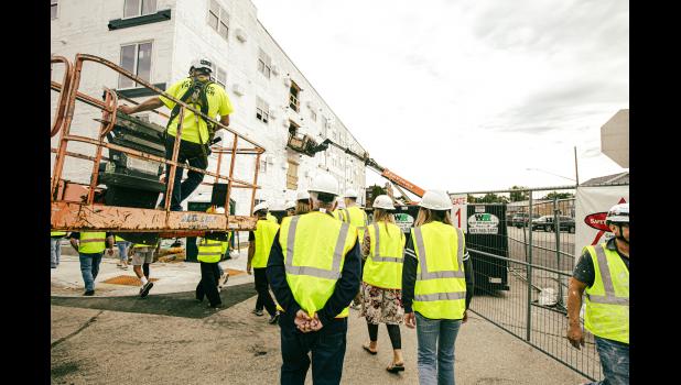 Members of the Port Authority, Wabasha city council, city staff and staff from the development company are led on a tour of the in-progress Alleghany Apartments by developer Andy Baartman of Keller-Baartman Properties. Photos by Sophie Horgan