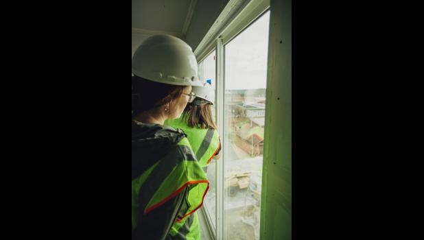 Visitors scope out the beautiful view of downtown Wabasha from a high-up unit.