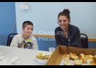Chancer Miller and Elle Karlen also volunteered their time to help serve the meal on Sunday. Photo by St. Charles Press Editor Laura Berndt. 